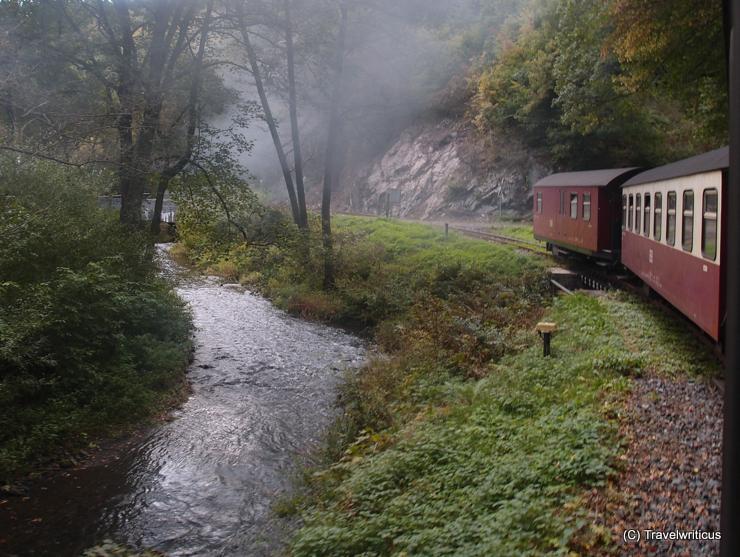 Passing the Selke River by the Selke Valley Railway in Harz, Germany