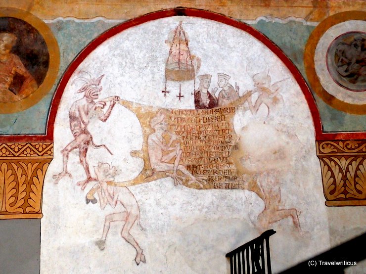 Fresco of devils and a cowhide at St George's Basilica