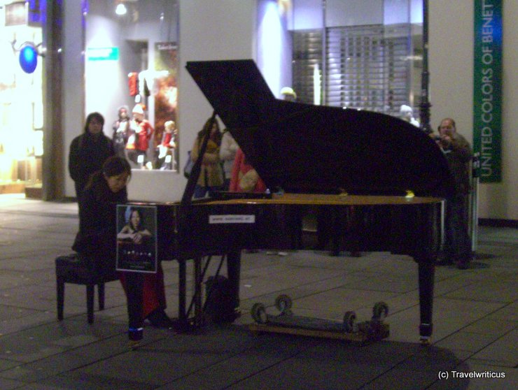 Piano player in a street of Vienna, Austria